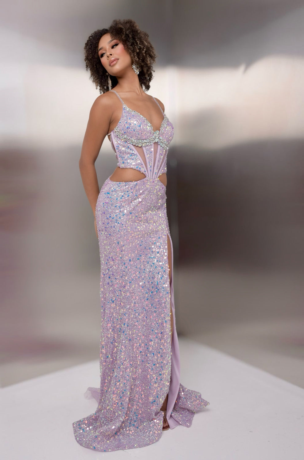 Jasz Couture 7916 Lilac sequined prom dress with a fitted silhouette and side slit, front view.