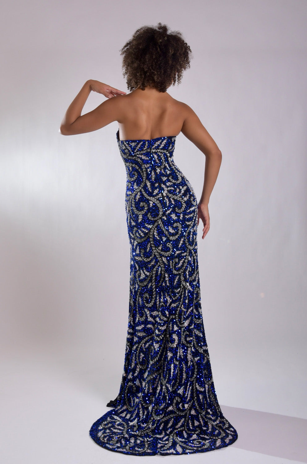 Jasz Couture 7922 Royal blue mermaid prom dress with intricate beading, back view.