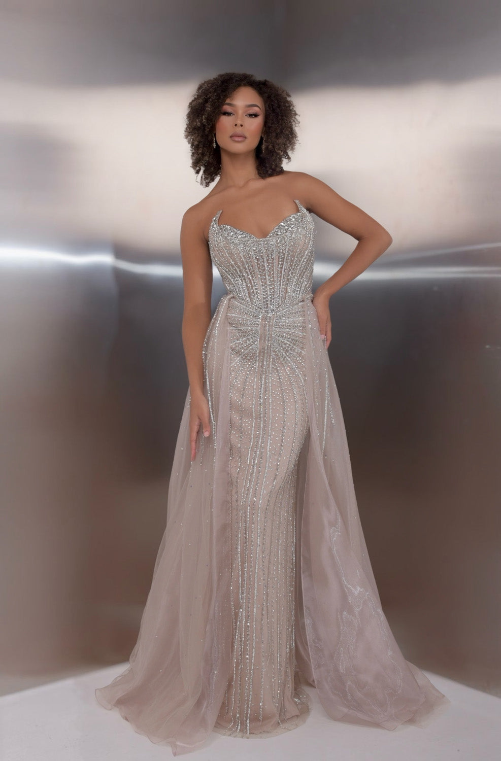 Jasz Couture 7932 Champagne mermaid prom dress with beading and a front slit.