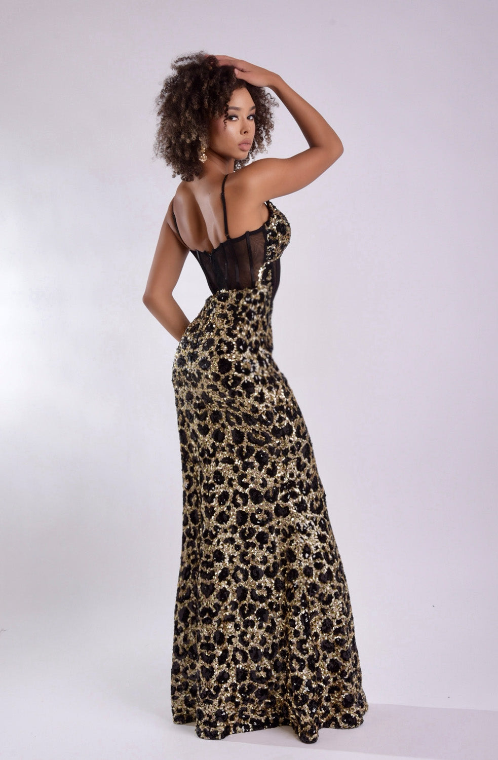Jasz Couture 7935 Black and gold mermaid prom dress with sequins, featuring a stunning back view.