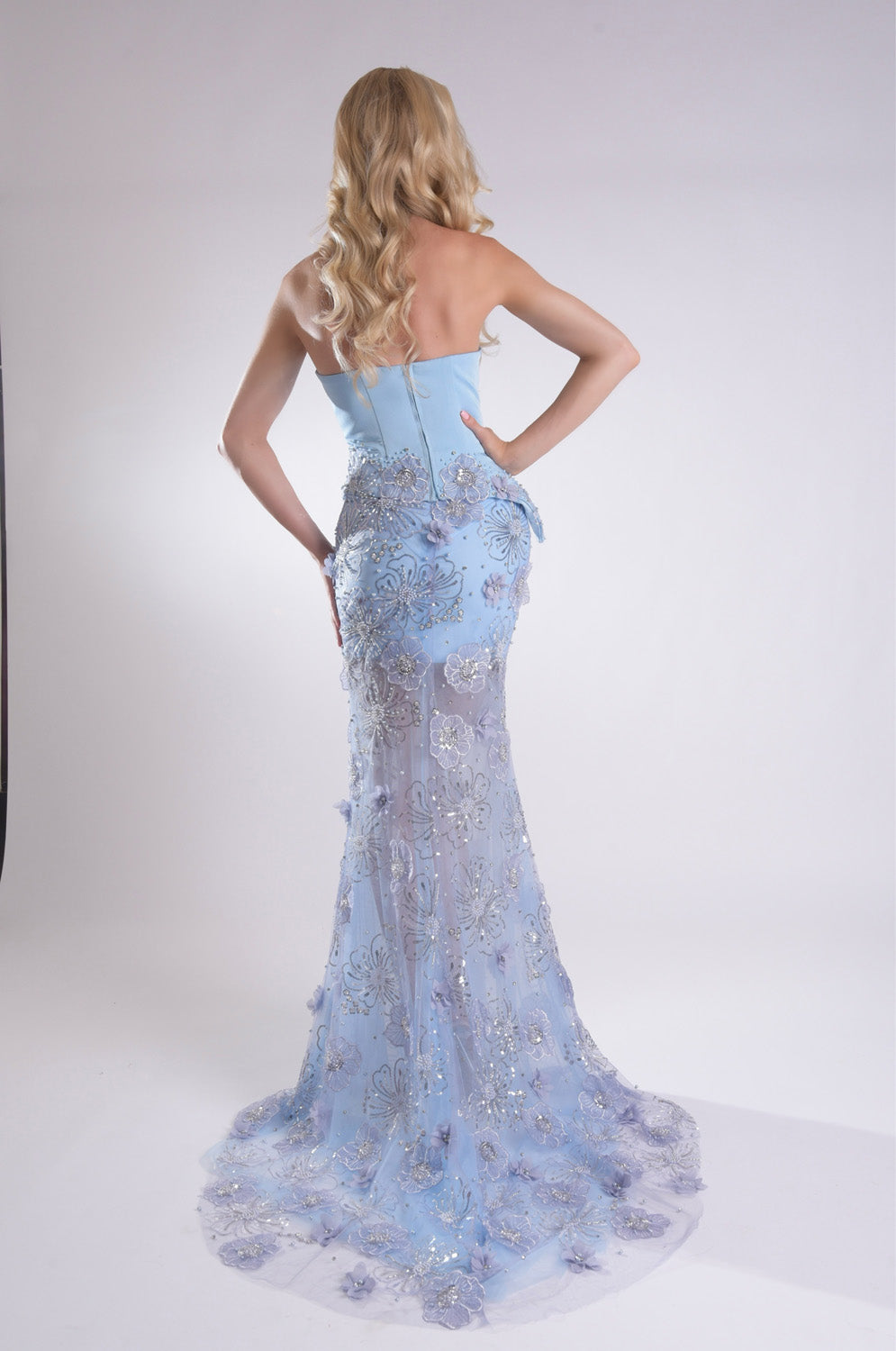 Jasz Couture 7937 Light blue mermaid prom dress with lace detailing and a stunning lace-up back.