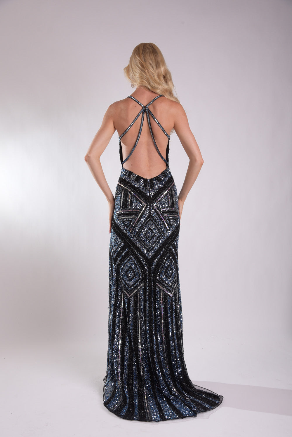Jasz Couture 7950 Black mermaid prom dress with intricate beading and a stunning open back view.