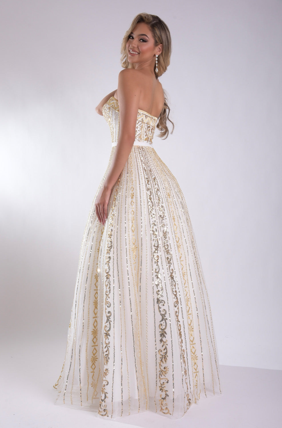 Jasz Couture 7952 White gold mermaid prom dress with intricate lace detailing and a stunning back view.