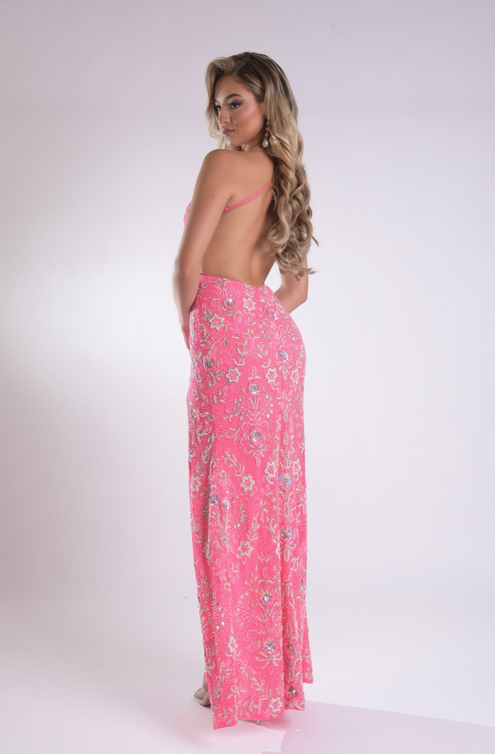 Jasz Couture 7954 Hot pink prom dress in print chiffon with a stunning lace-up back, back view.