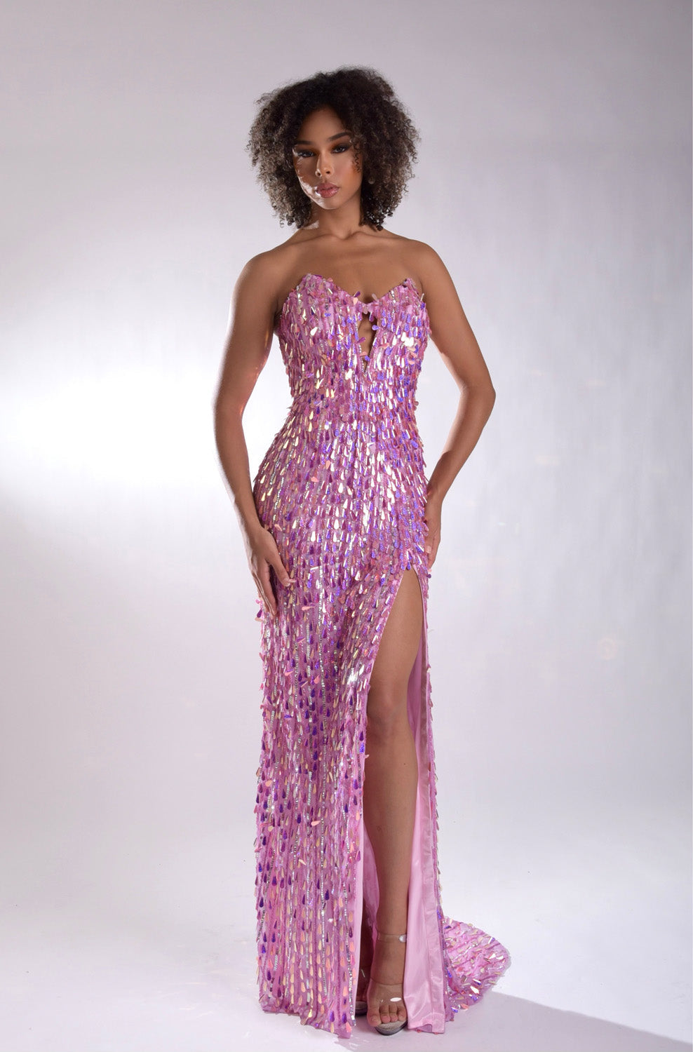 Jasz Couture 7973 Pink mermaid prom dress with a thigh-high slit and shimmering sequins, front view.