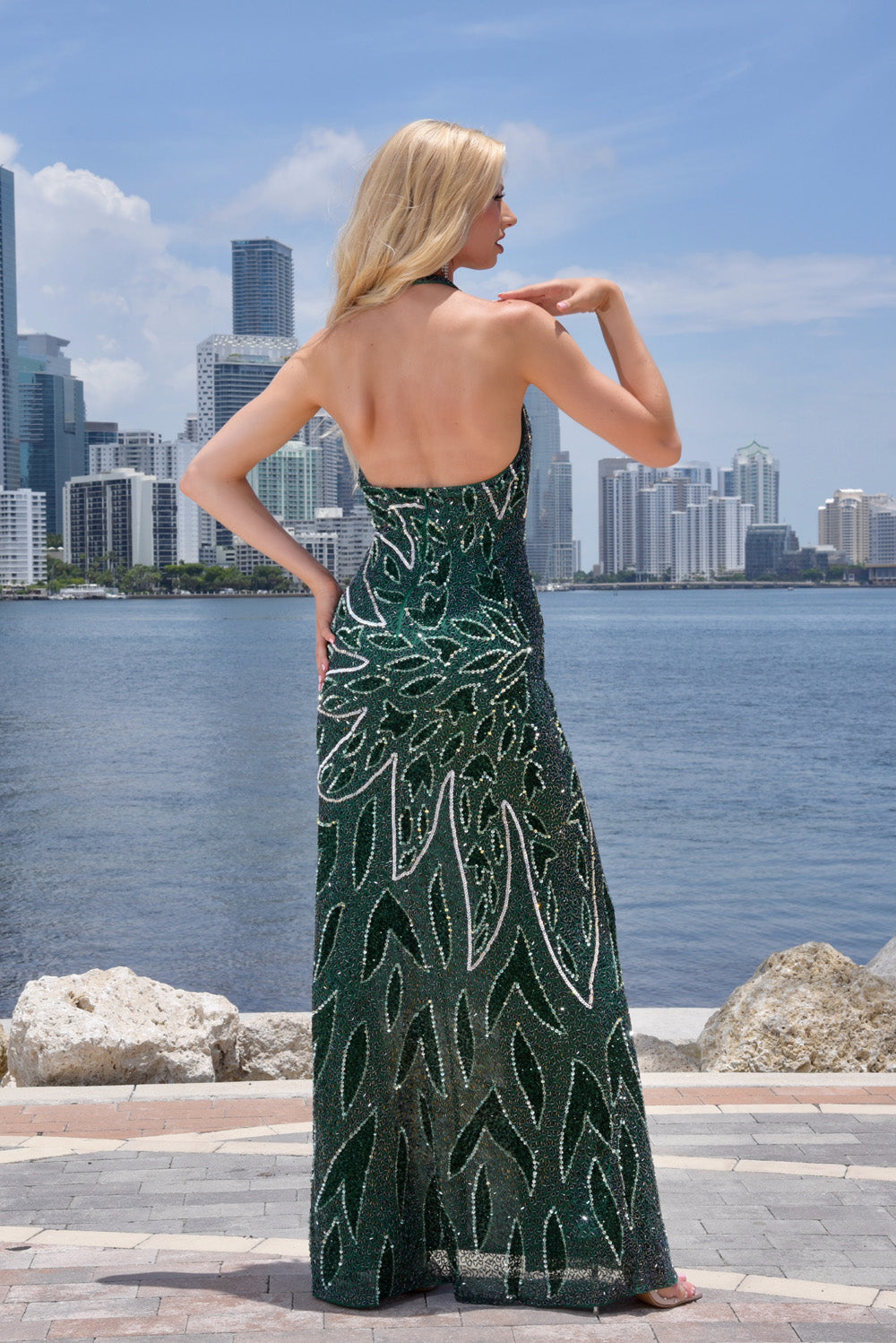 Jasz Couture 7975 Emerald mermaid prom dress with a stunning lace-up back and intricate beading, back view.