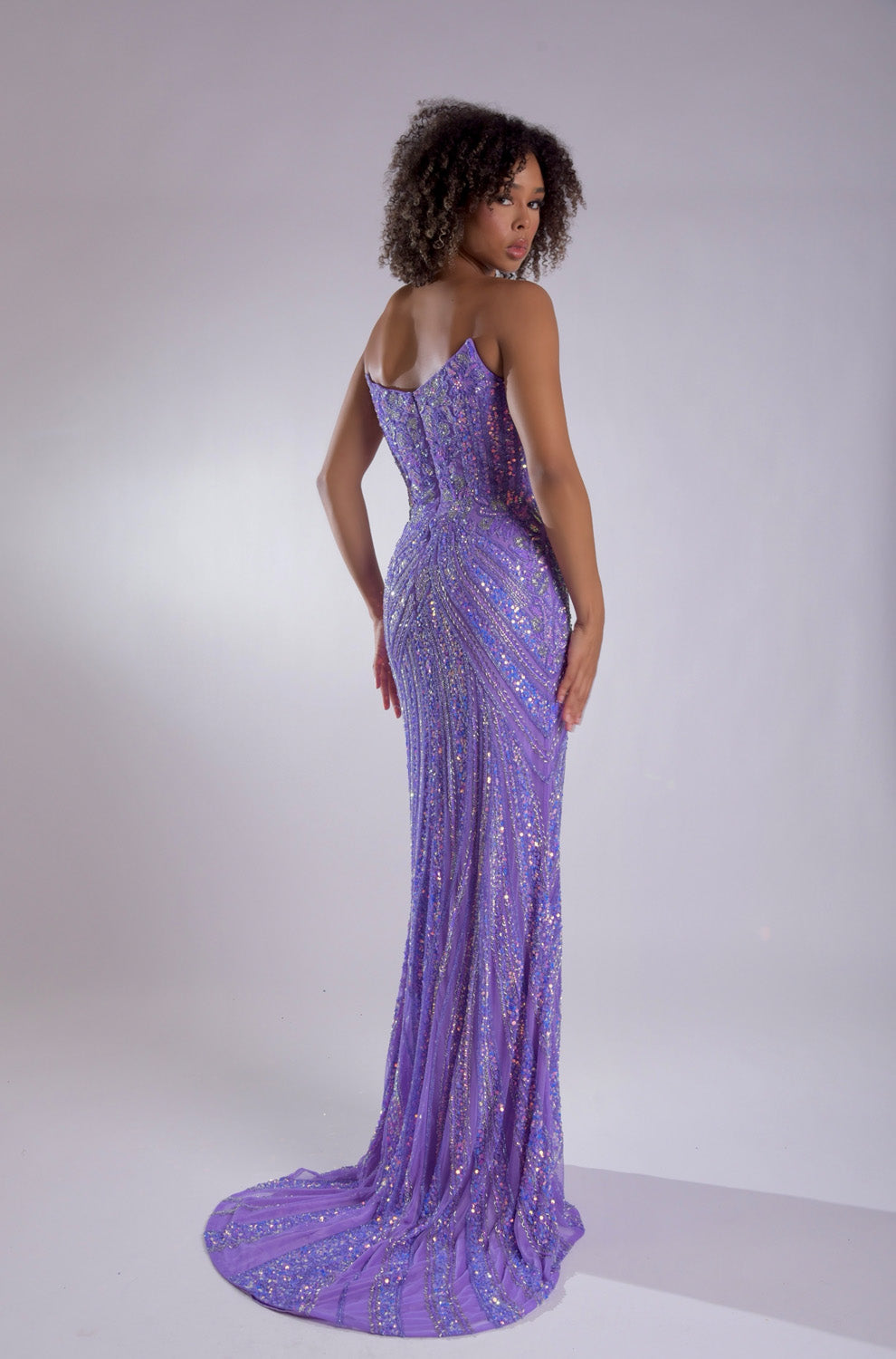 Jasz Couture 7984 Lilac mermaid prom dress with intricate lace and a stunning back design.