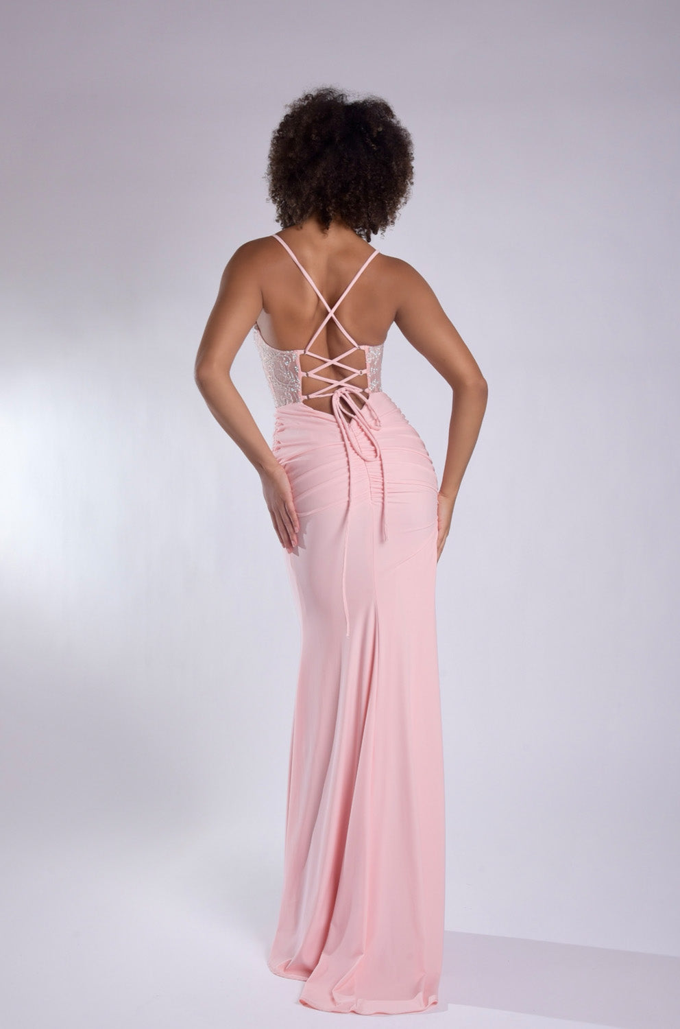 Jasz Couture 7986 Pink fitted prom dress with lace-up back and elegant silhouette, back view.