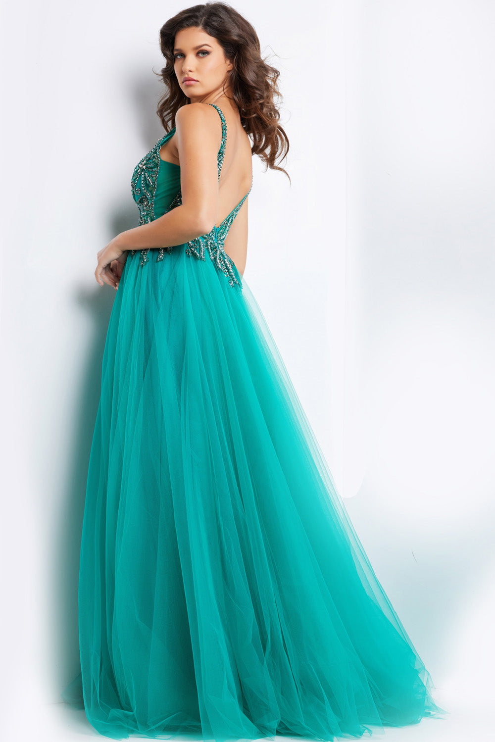 Jovani 23962 Emerald A-line prom dress with beaded bodice and open back design.