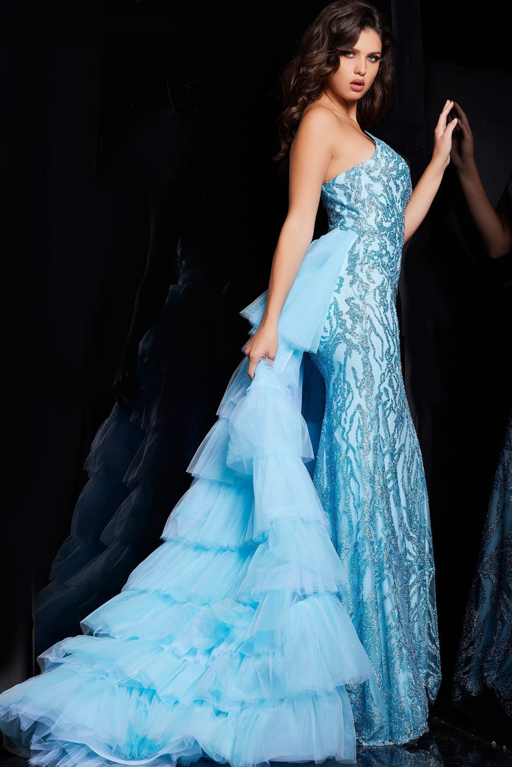 Jovani 26119 Turquoise mermaid prom dress with sequins and a dramatic ruffled train.