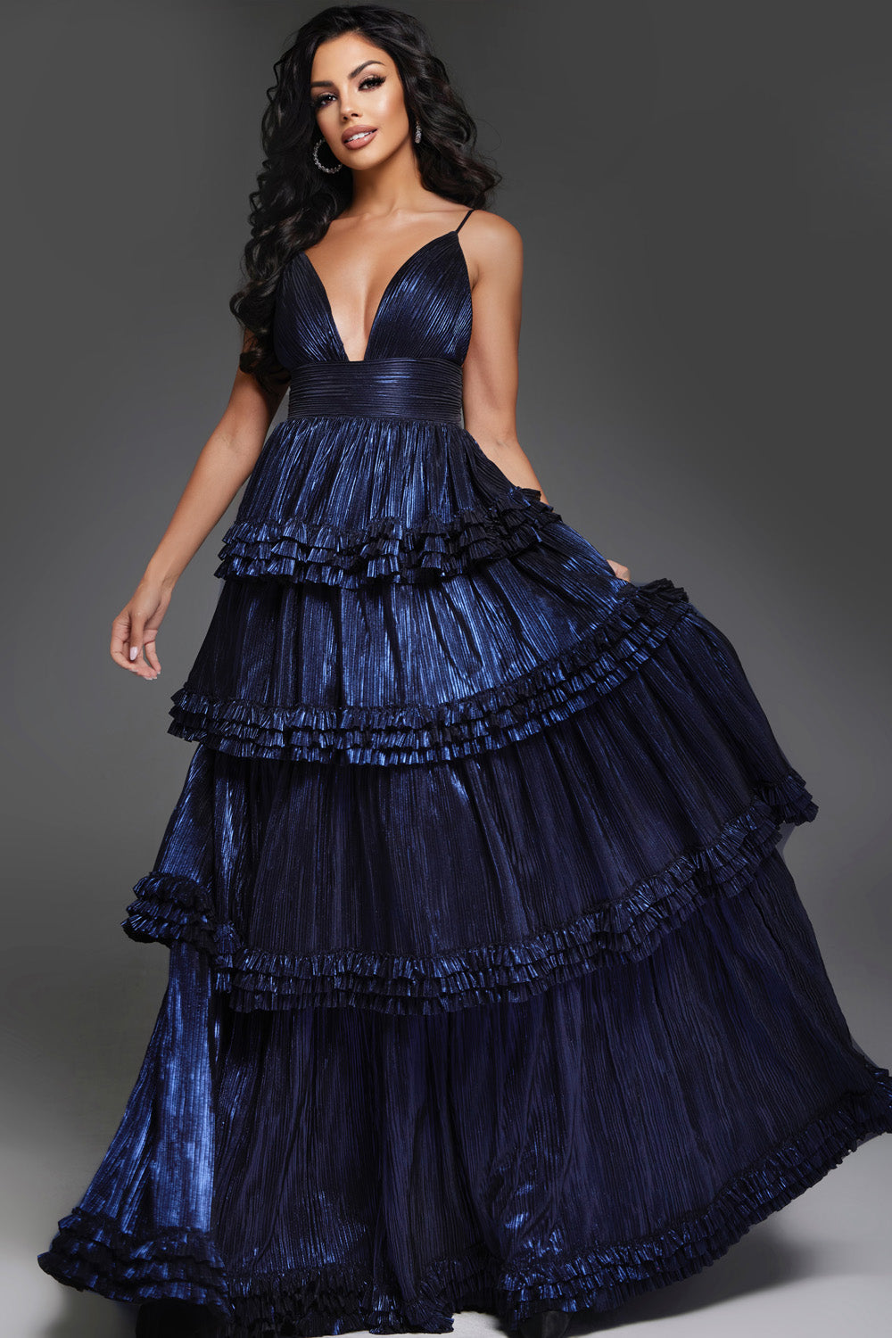 Jovani 38296 Navy tiered prom dress with a plunging neckline and ruffled hem.