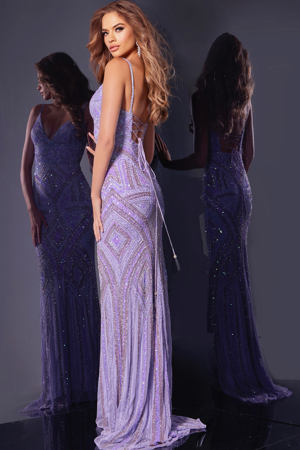 Jovani 38848 Lilac silver fitted prom dress with intricate beading and lace-up back, back view.