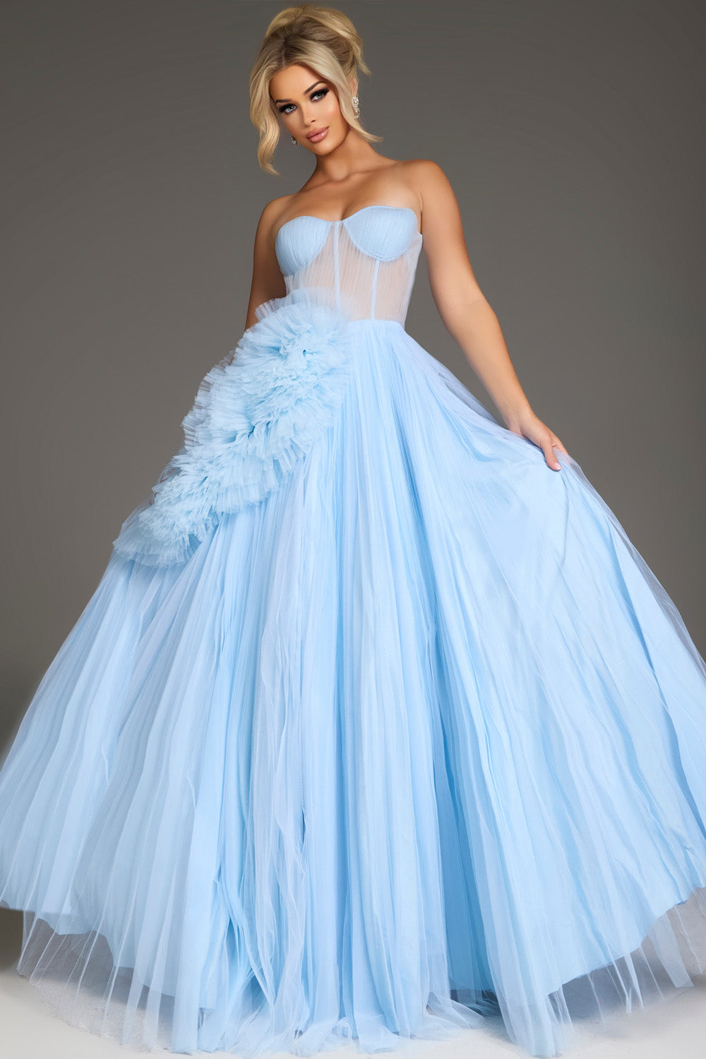 Jovani 38946 Pale blue A-line prom dress with a ruffled detail and strapless design.