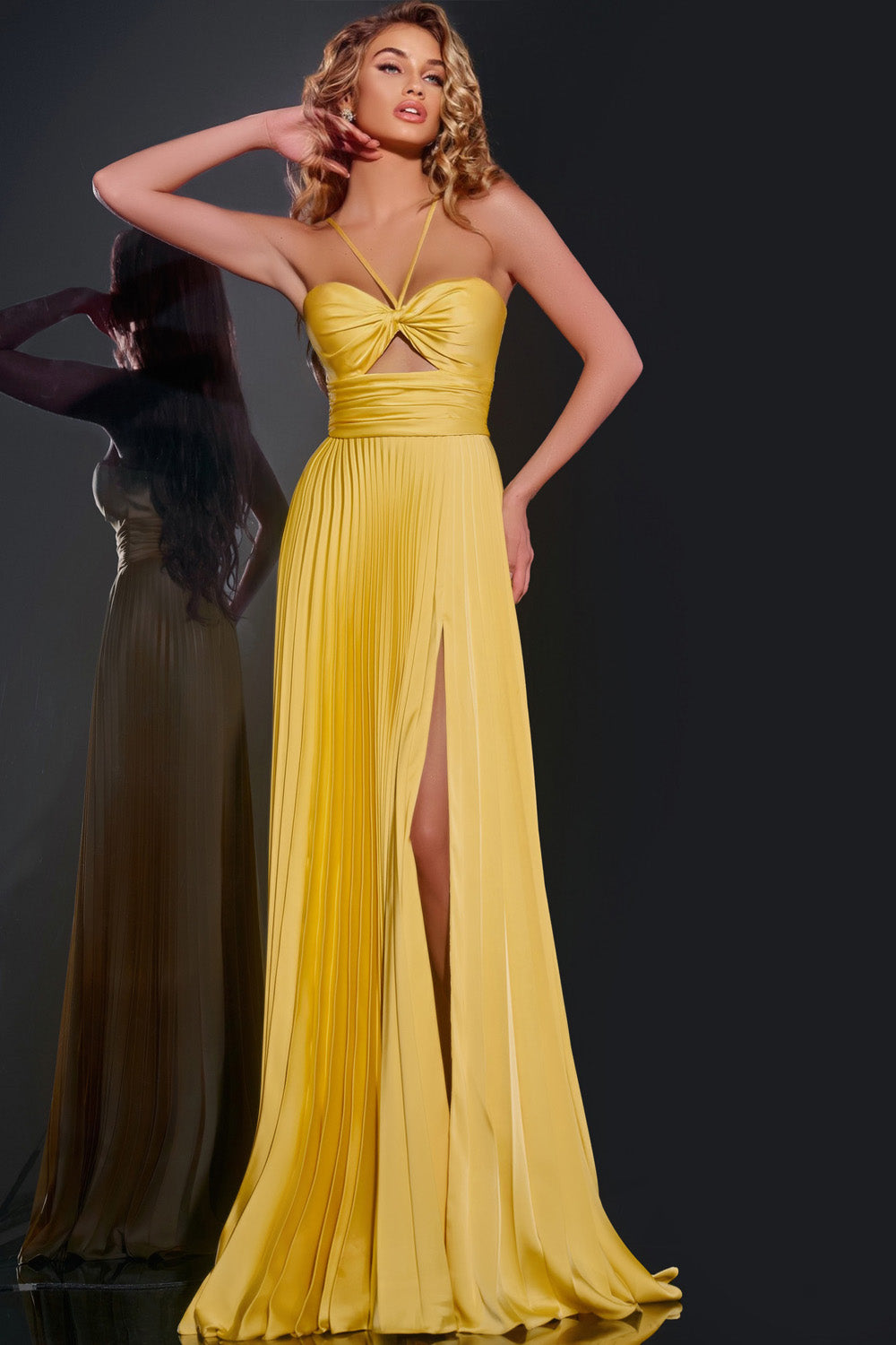 Jovani 42971 Yellow pleated prom dress with a high slit and sweetheart neckline, front view.