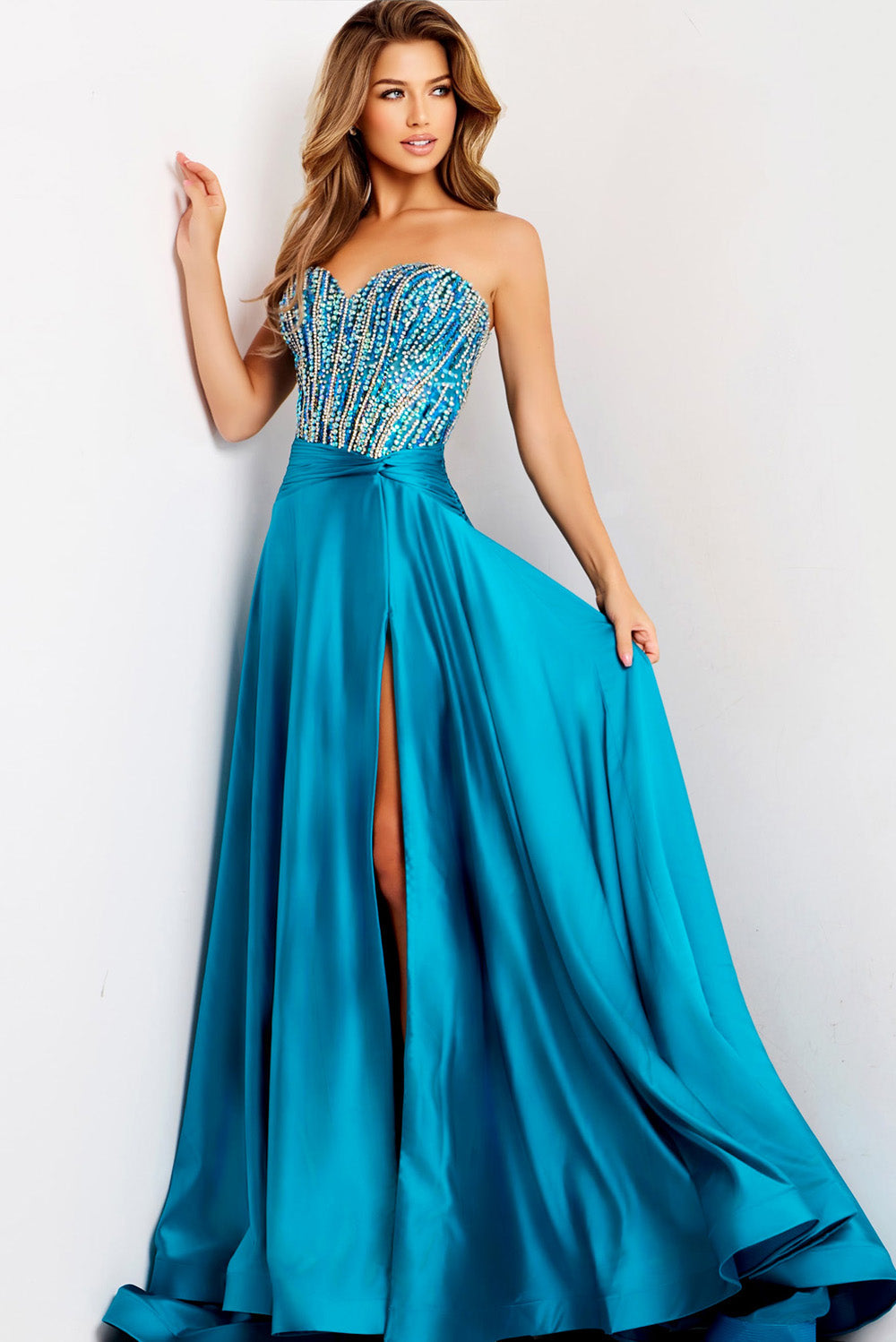 Jovani 43729 Strapless peacock prom dress with beaded bodice and high slit, front view.
