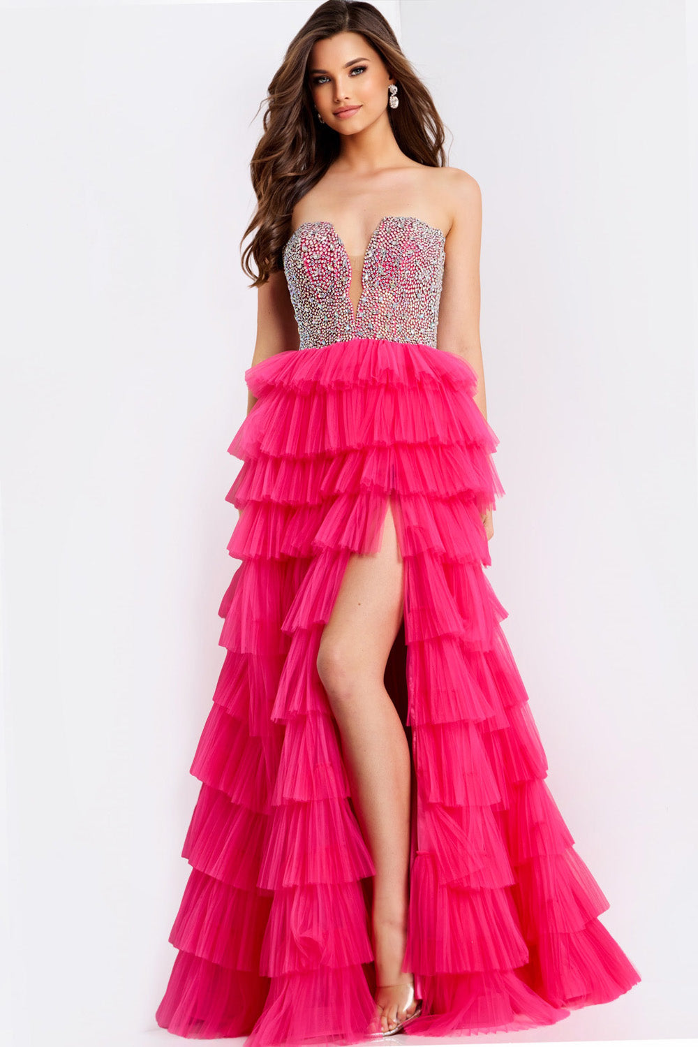 Jovani 44360 Fuchsia prom dress with tiered ruffles and a high slit, front view.