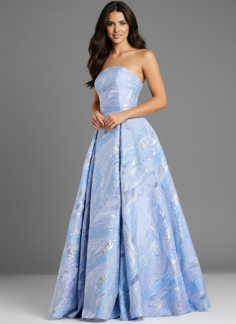 Jovani 44369 Strapless blue prom dress with a full skirt and shimmering fabric details.
