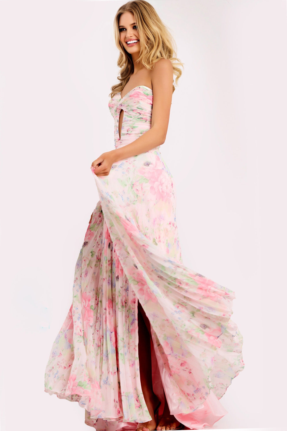 Jovani 44518 Pink floral prom dress with a fitted silhouette and side slit.