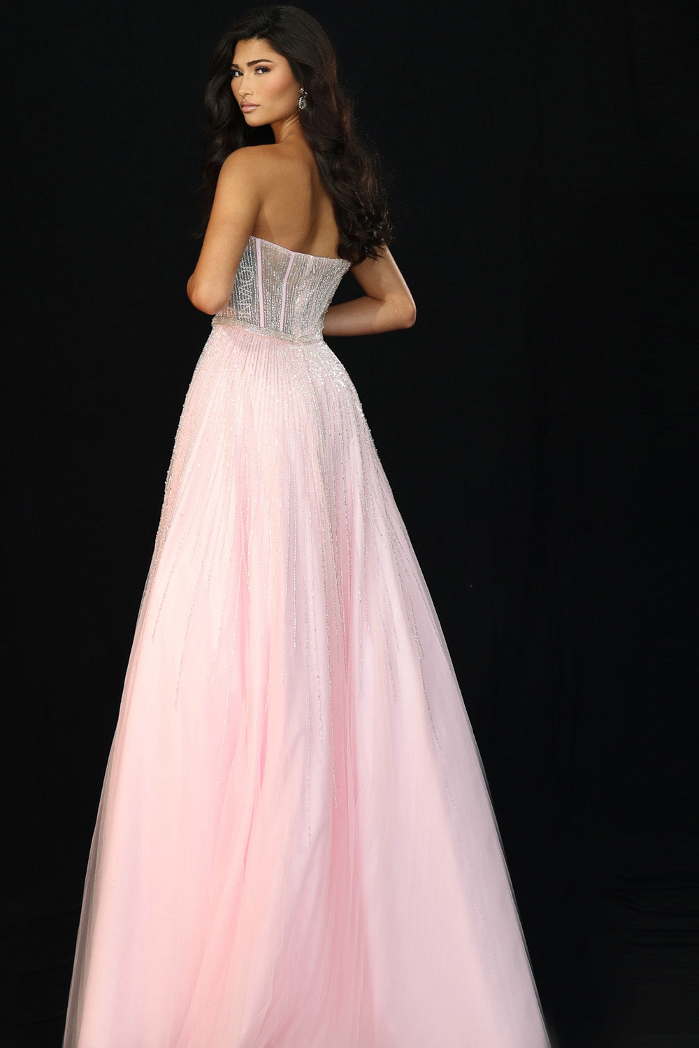 Jovani 45885 Pink A-line prom dress with beaded bodice and flowing tulle skirt, back view.