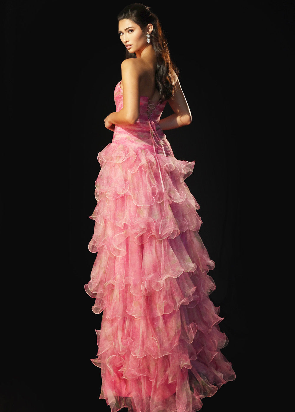 Jovani 46408 Fuchsia prom dress with ruffled layers and lace-up back, back view.