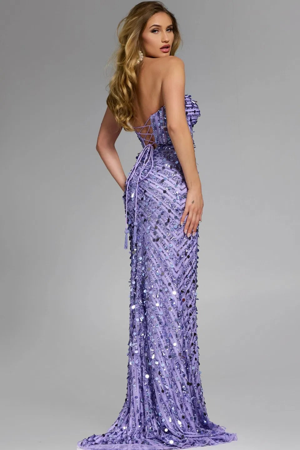 Jovani 46714 sequined mermaid lilac prom dress with lace-up back, back view.