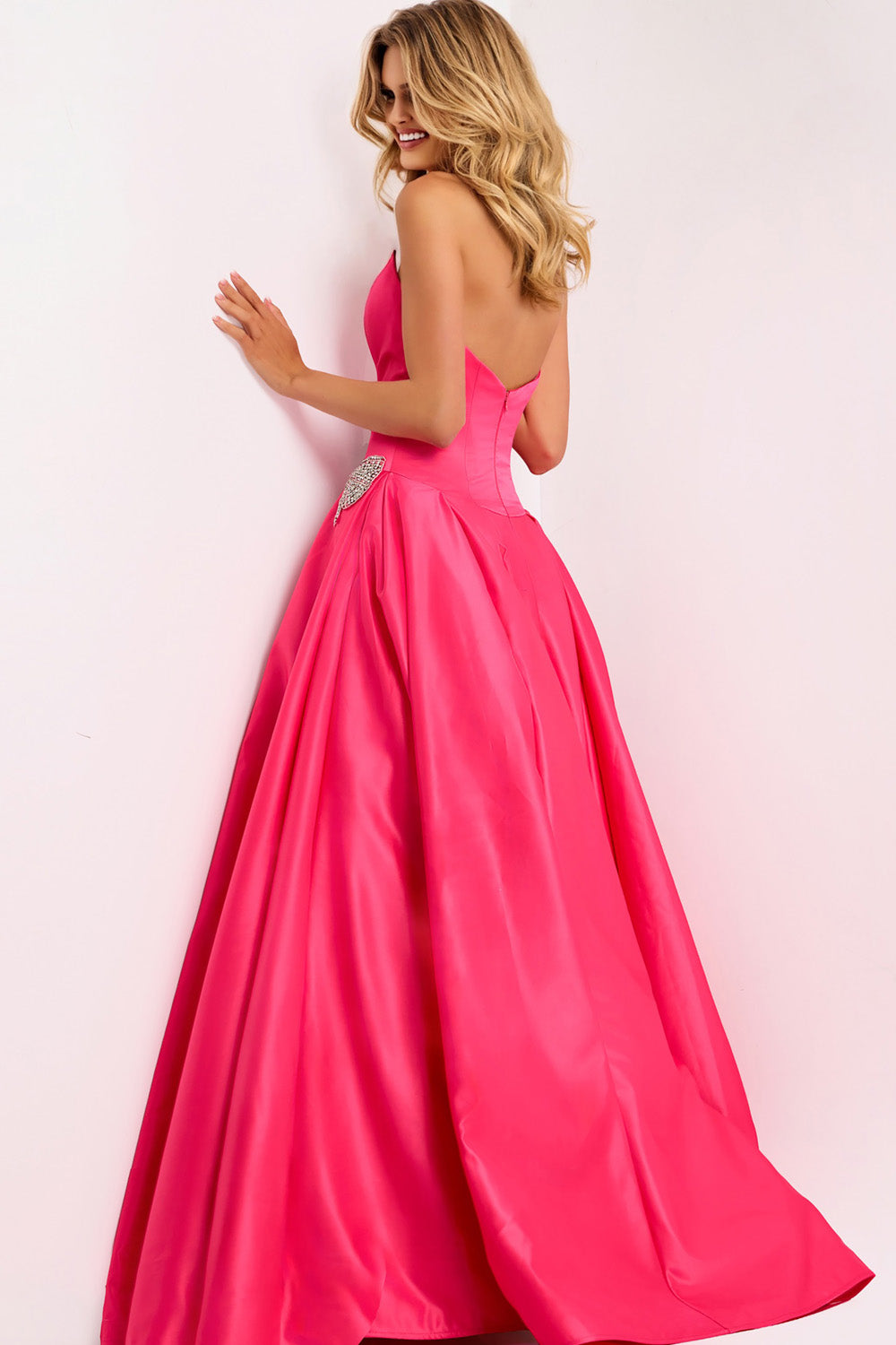 Jovani 47096 Fuchsia ballgown with a corset back and flowing skirt, perfect for prom prom dress.