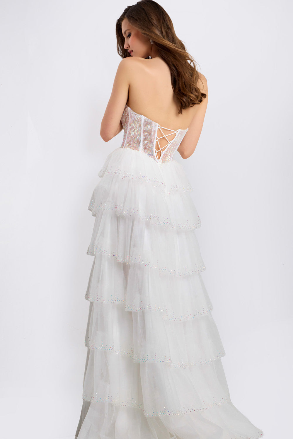 Jovani 47290 Off-white tiered formal gown with lace-up back and ruffled layers.
