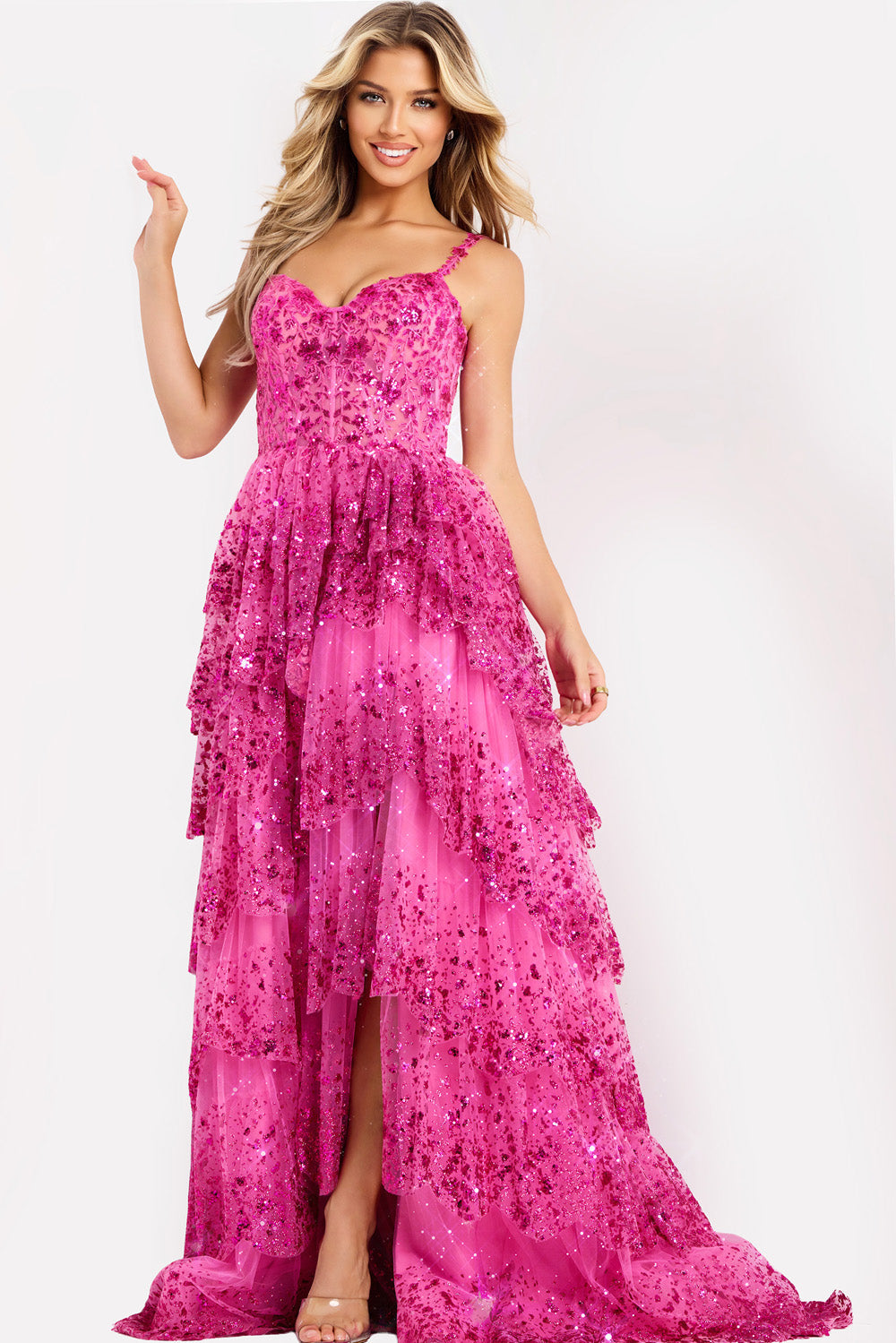 Jovani 47320 Fuchsia prom dress with layered ruffles and a high slit, front view.
