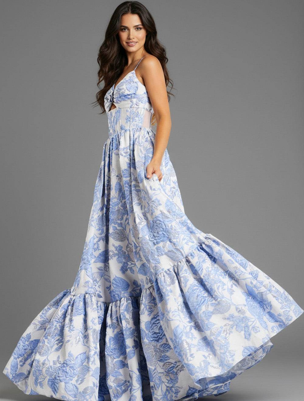 Jovani 47328 Light blue floral A-line prom dress with a sweetheart neckline and ruffled hem.