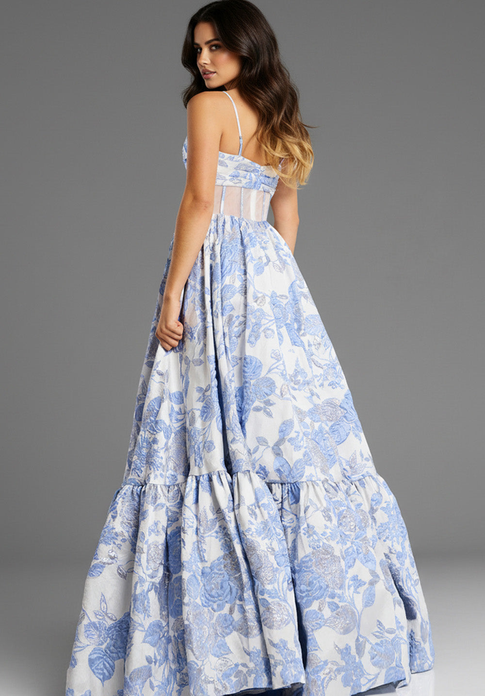 Jovani 47328 Light blue floral A-line prom dress with a sweetheart neckline and ruffled hem.