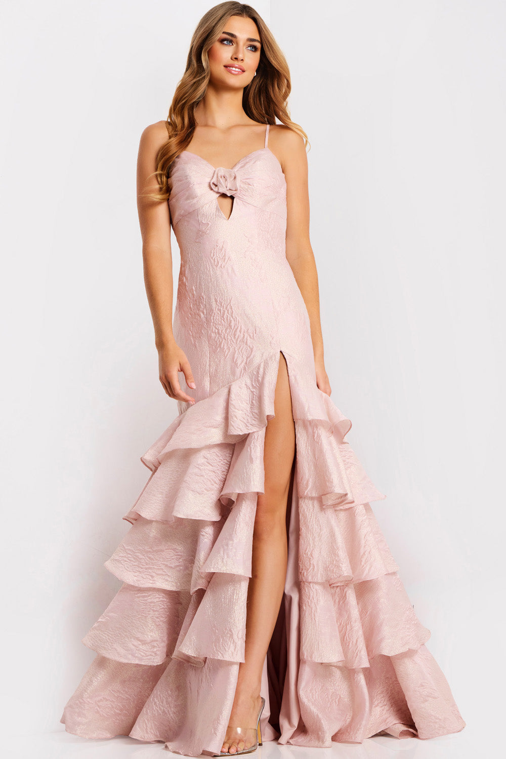 Jovani 47329 Pink mermaid prom dress with a high slit and ruffled hem detail.