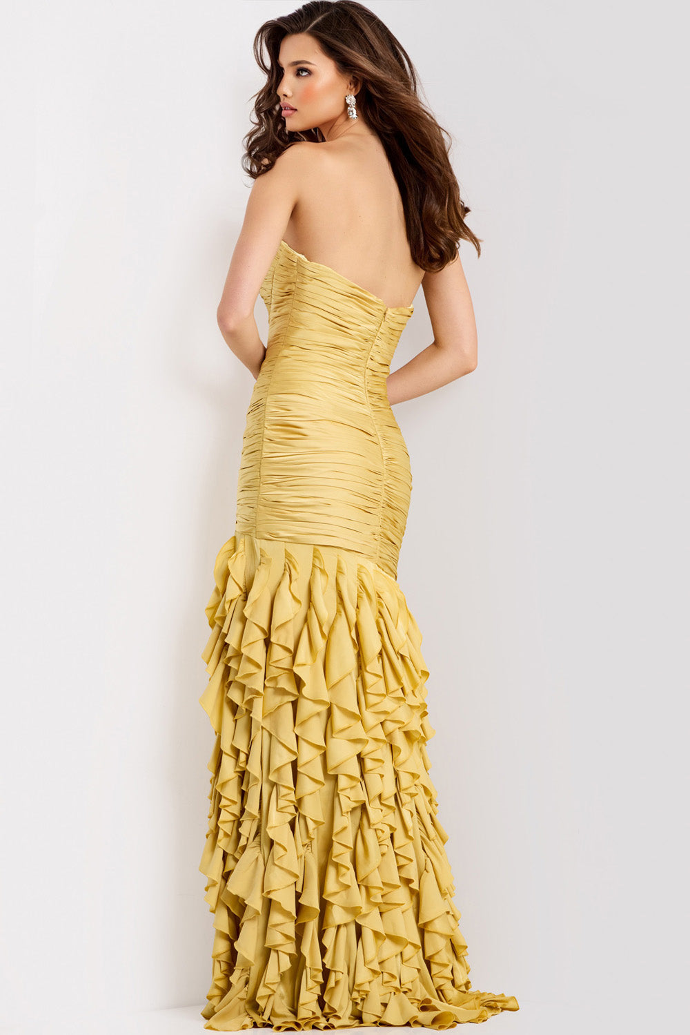 Jovani 47553 Yellow mermaid prom dress with ruffled skirt and a strapless back view.