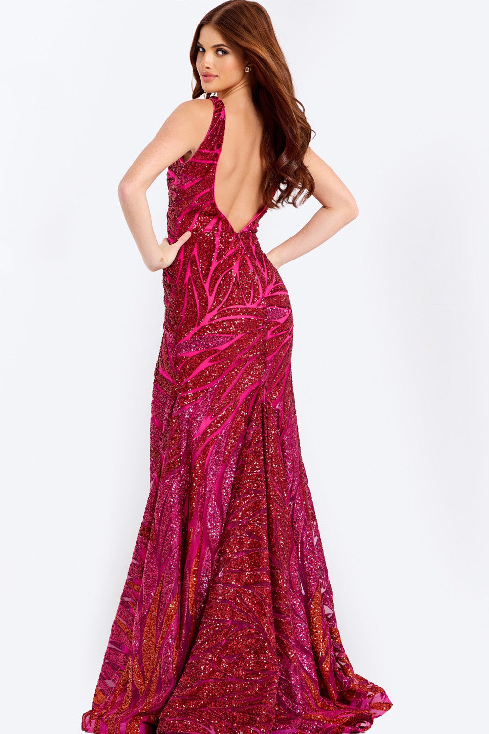Jovani 47682 Fuchsia multi prom dress with a fitted silhouette and stunning backless design.