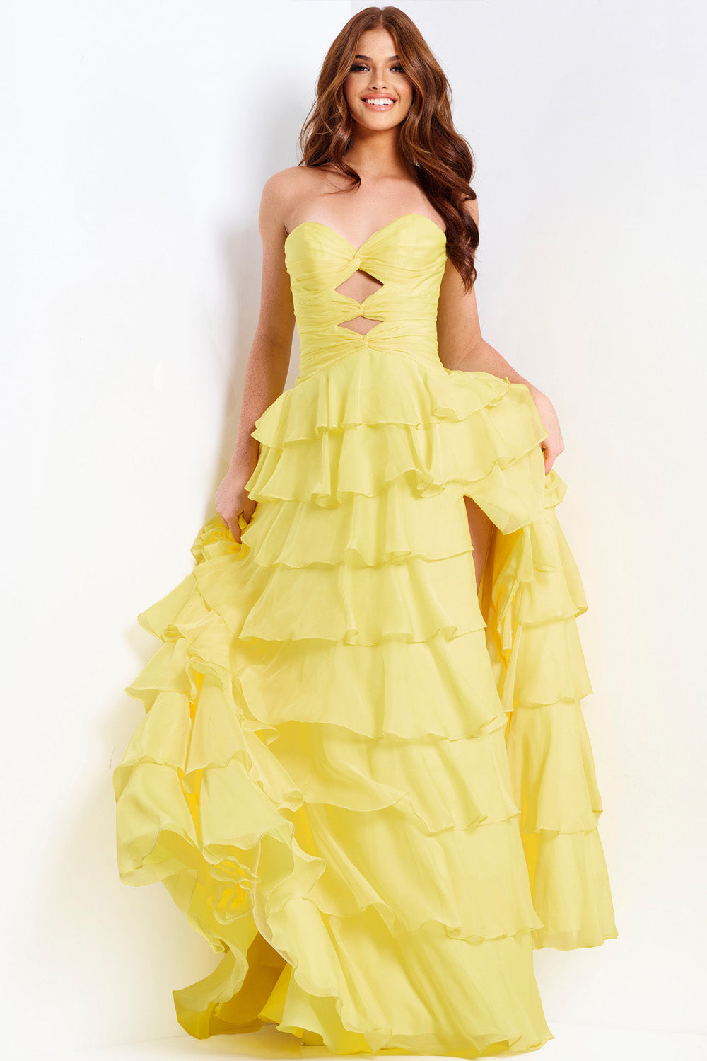 Jovani 47743 Strapless yellow prom dress with ruffled layers and a side slit.