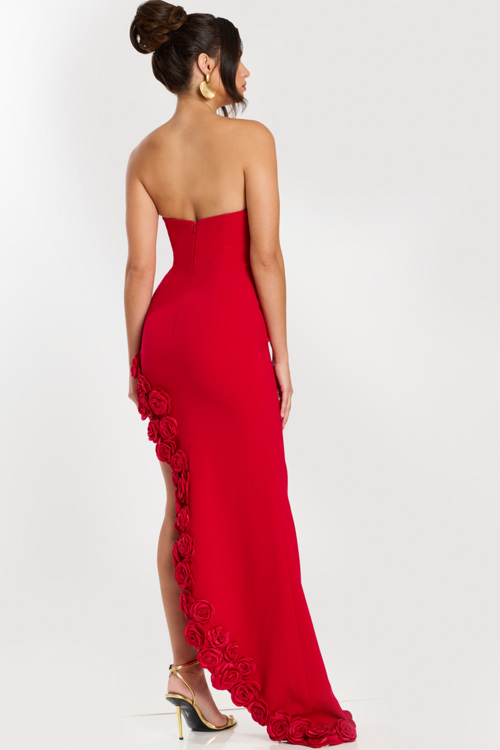 Jovani 47798 Red mermaid prom dress with floral detailing and a side slit, back view.