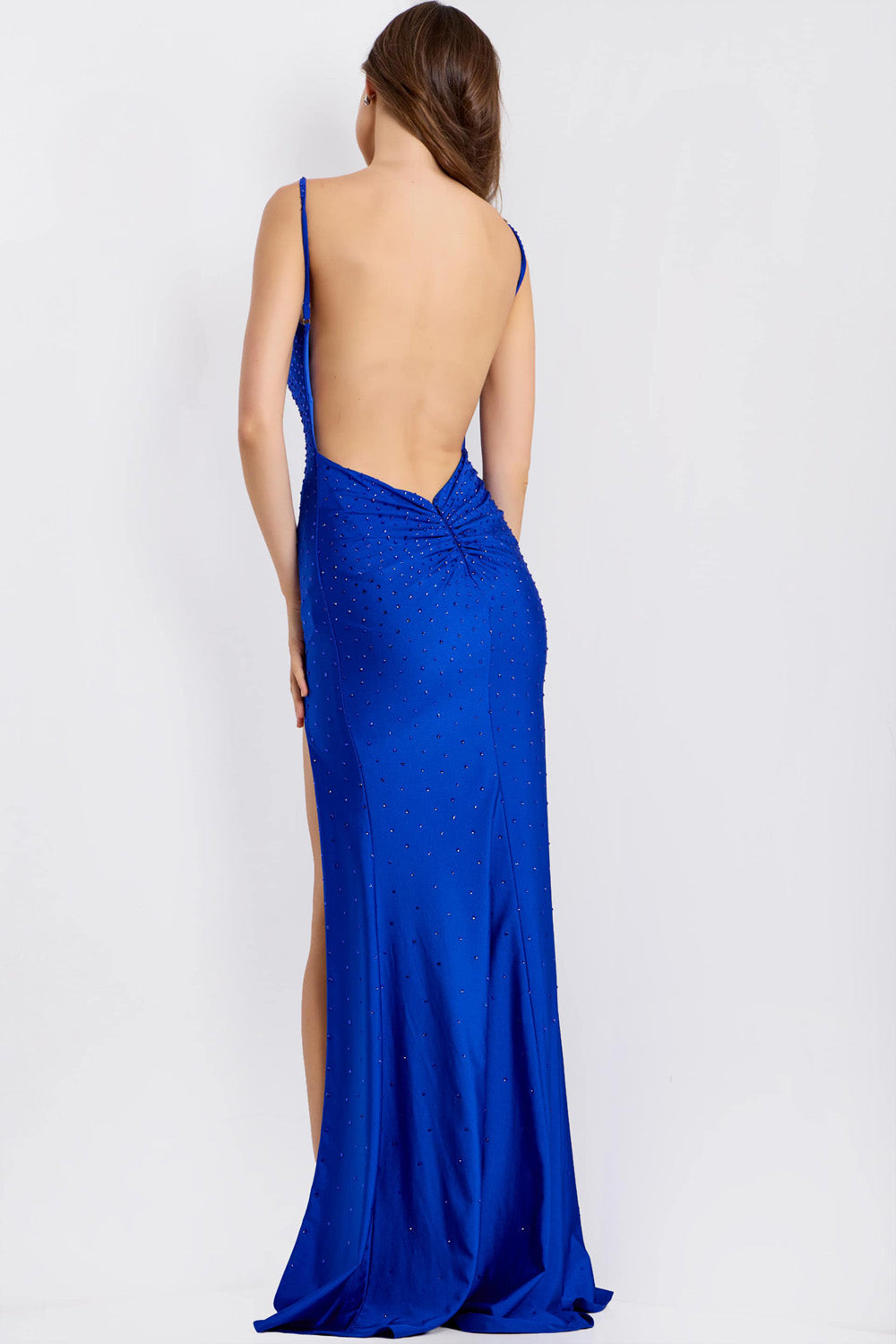 Jovani 48072 Royal blue fitted prom dress with a high slit and open back design.
