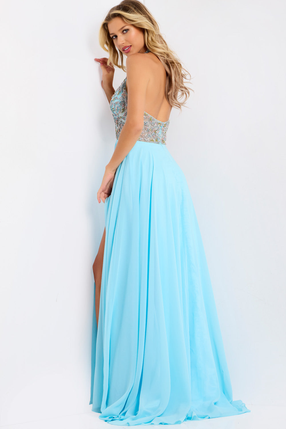 Jovani 48300 Light blue formal gown with a high slit and embellished bodice, back view.
