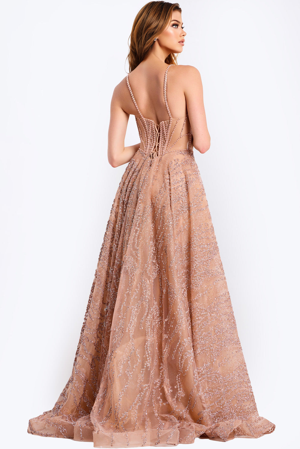 Jovani 48365 Rose gold formal gown with a fitted silhouette and intricate beading, back view.