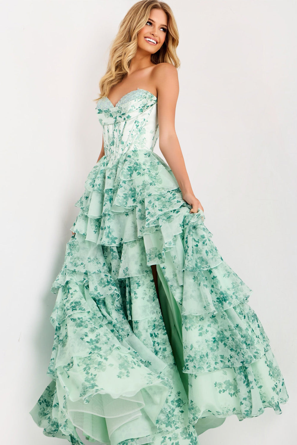 Jovani 48772 Blush and green floral prom dress with a tiered skirt and side slit.