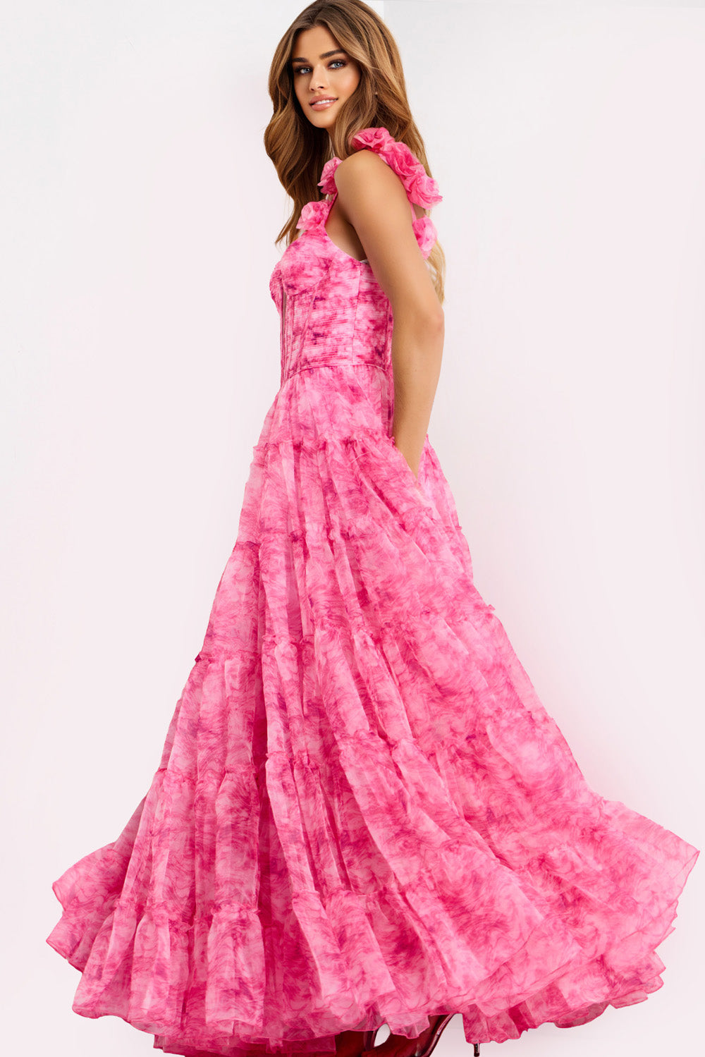 Jovani 49074 Pink tiered prom dress with ruffled straps and a flowing silhouette.