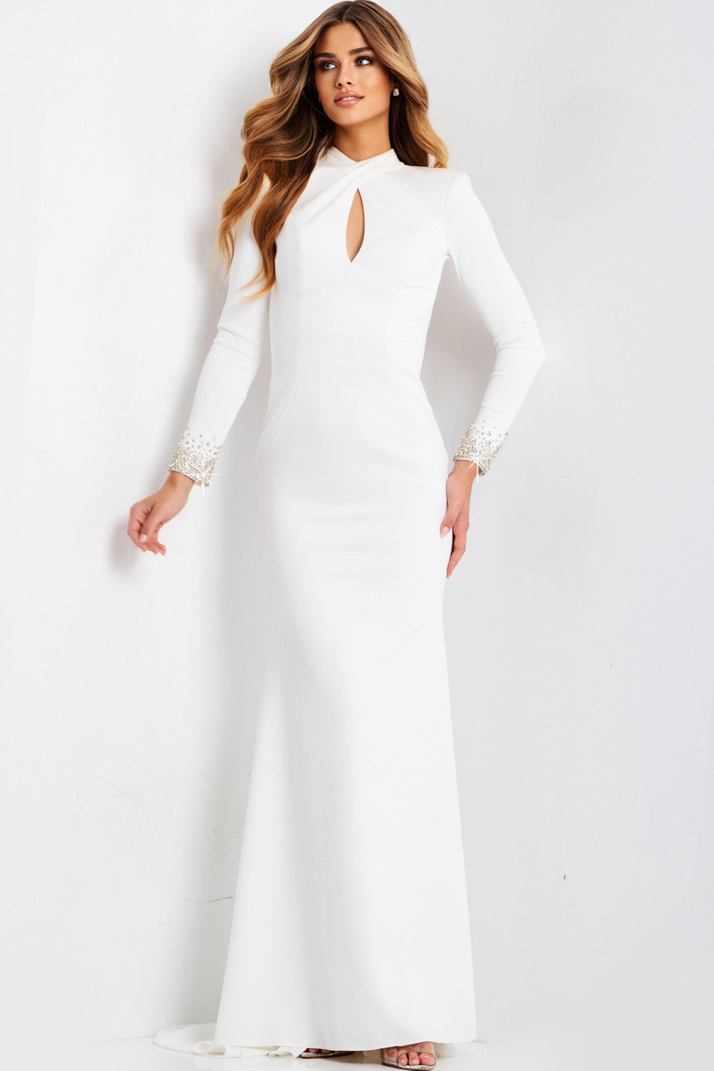 Jovani 49126 White fitted prom dress with long sleeves and embellished cuffs, featuring a keyhole neckline.
