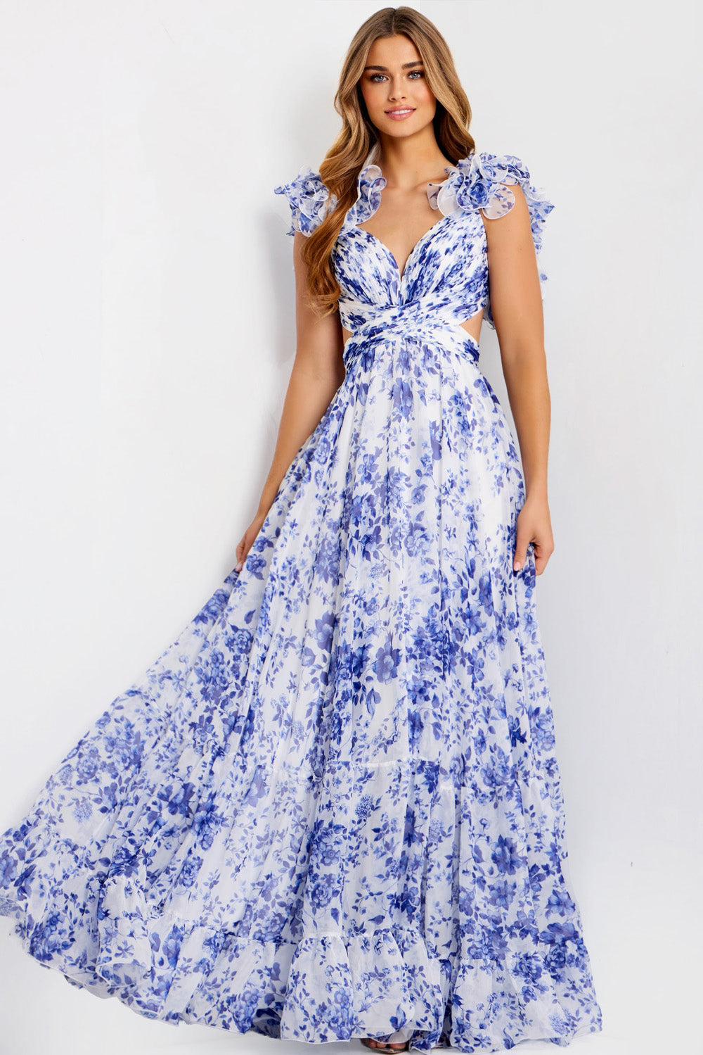 Jovani 49143 White and blue floral A-line prom dress with ruffled sleeves and a plunging neckline.