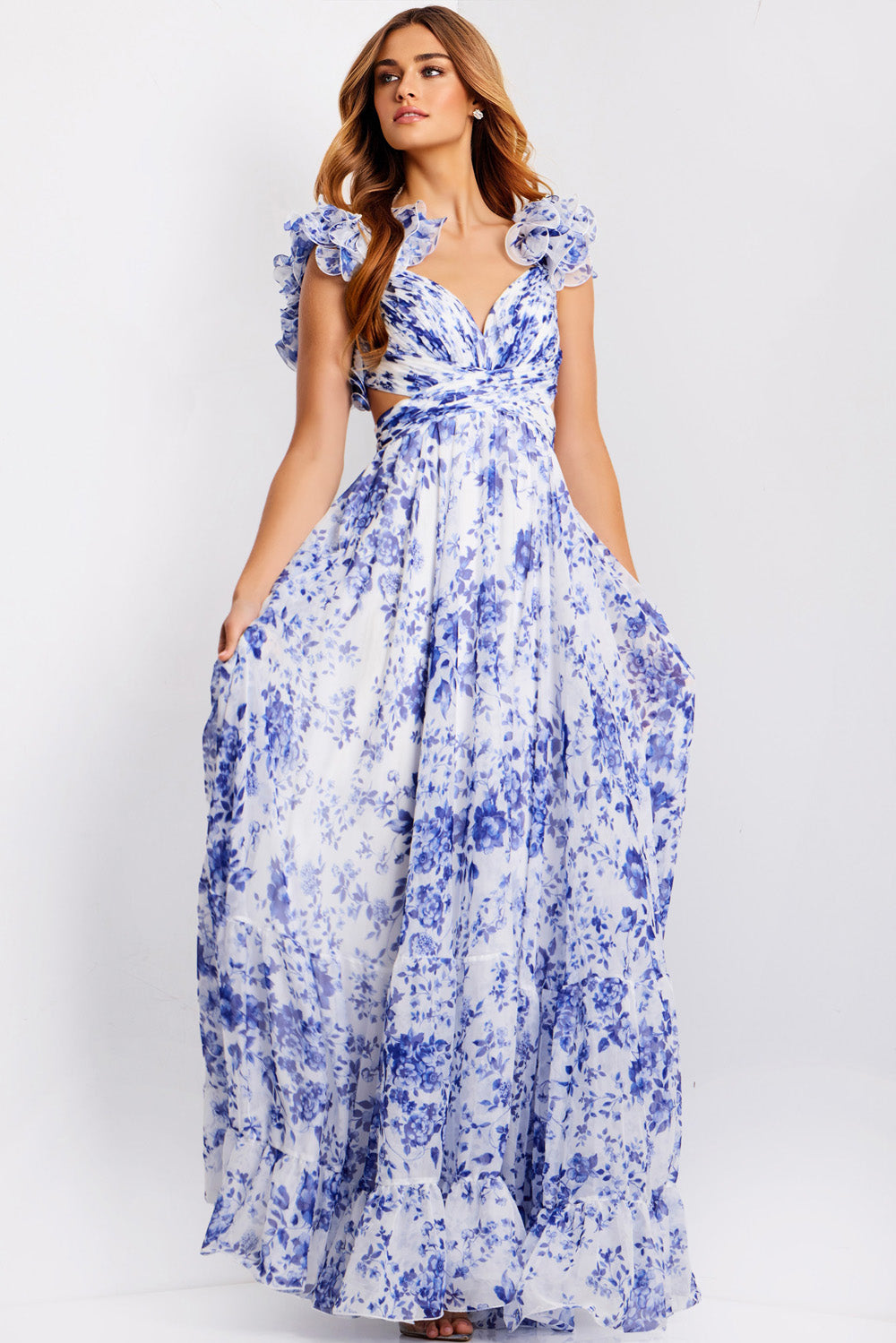 Jovani 49143 White and blue floral prom dress with ruffled sleeves and a flowing silhouette.
