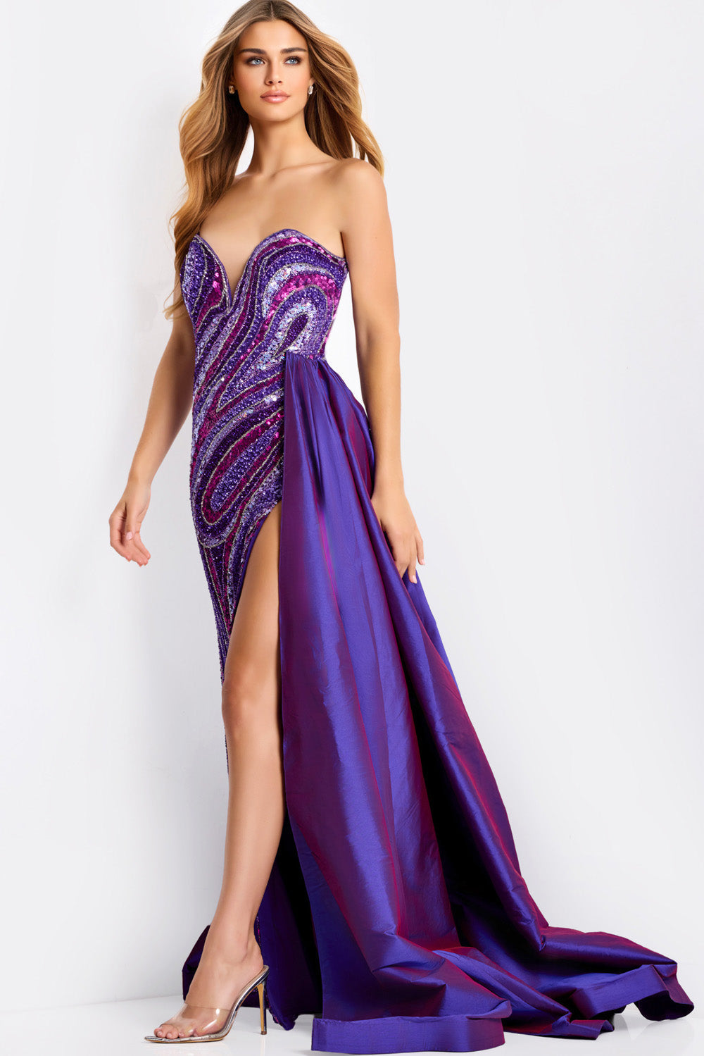 Jovani 49226 Dark purple mermaid prom dress with sequins and a high slit, side view.