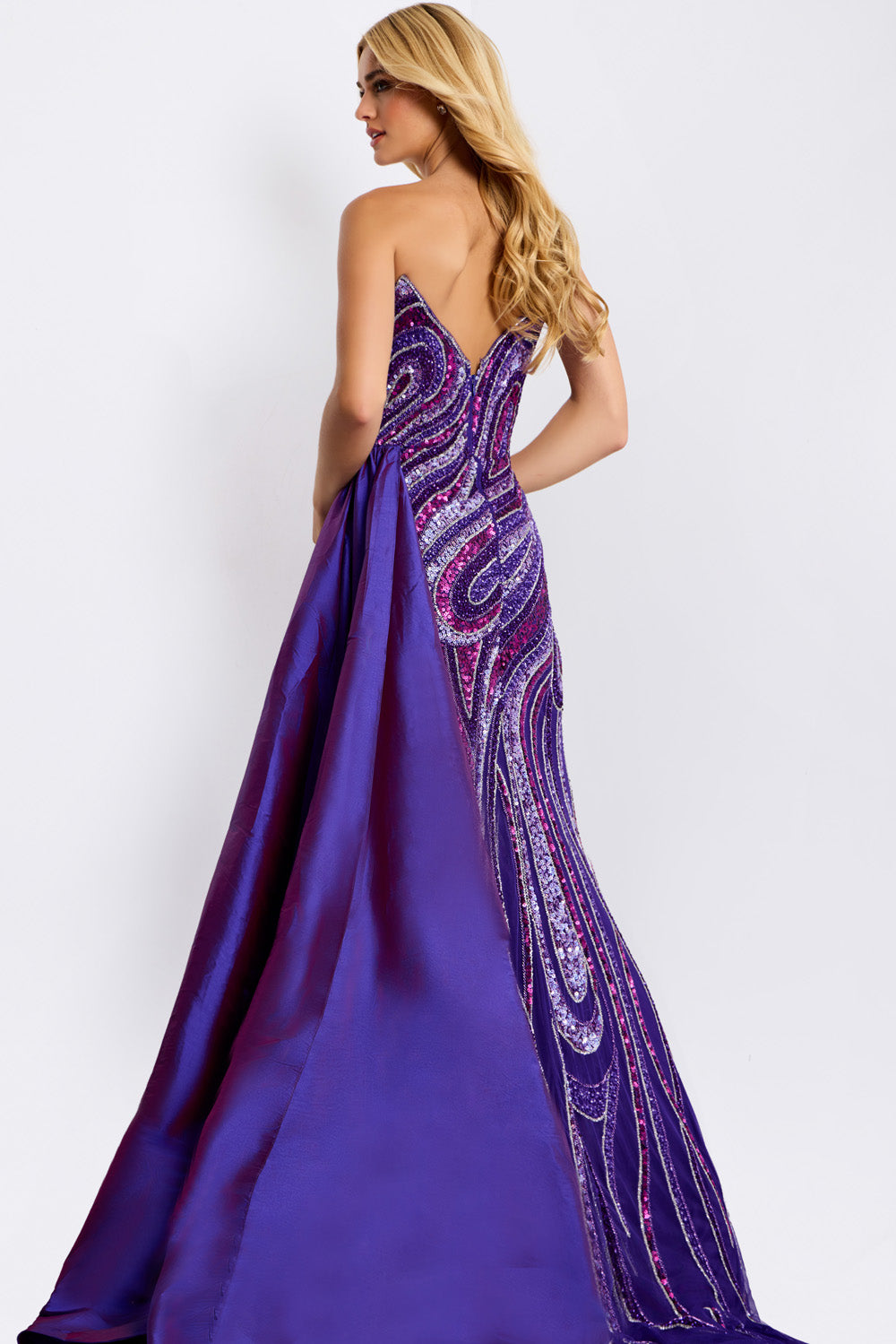 Jovani 49226 Dark purple mermaid prom dress with sequins and a low back, back view.