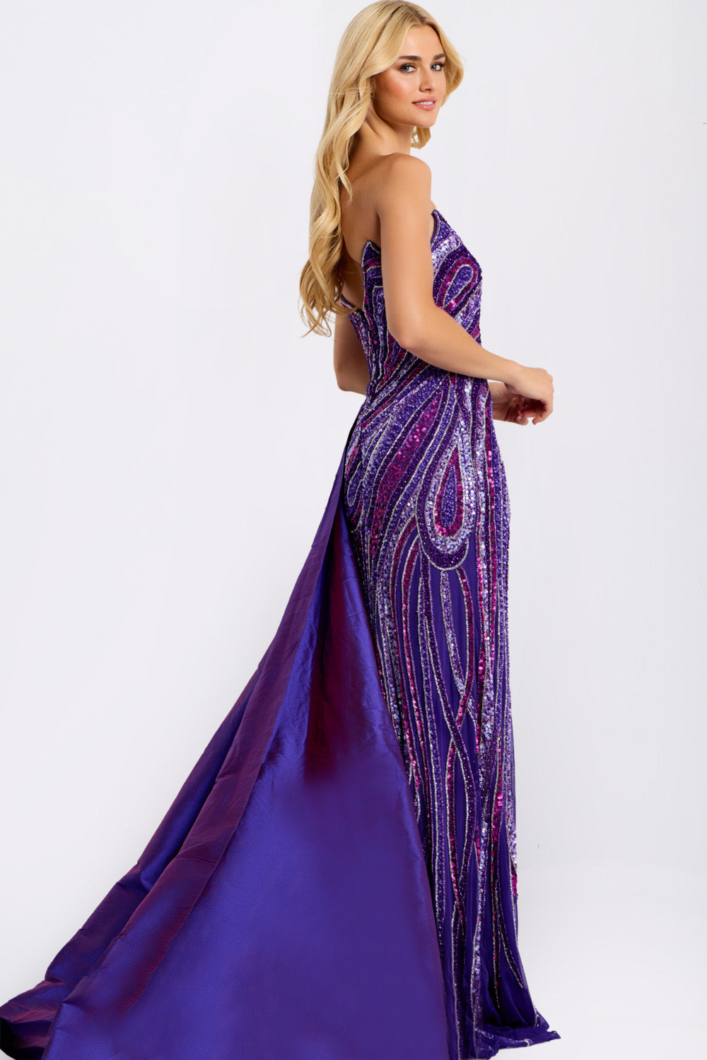 Jovani 49226 Dark purple mermaid prom dress with intricate beading, side view.