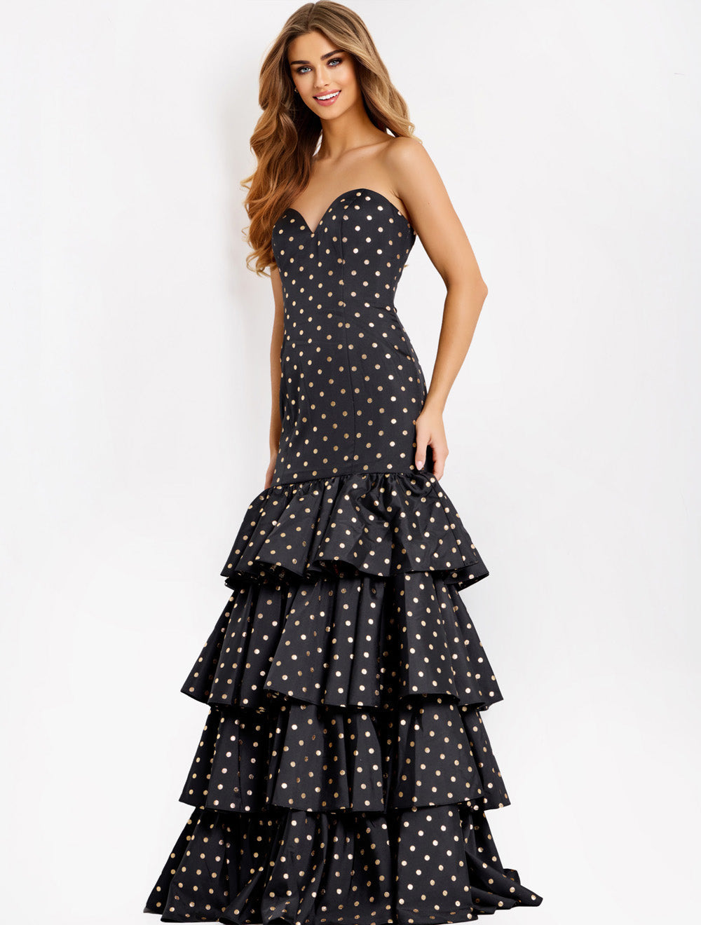 Jovani 49419 Black and gold mermaid prom dress with a ruffled skirt and sweetheart neckline.