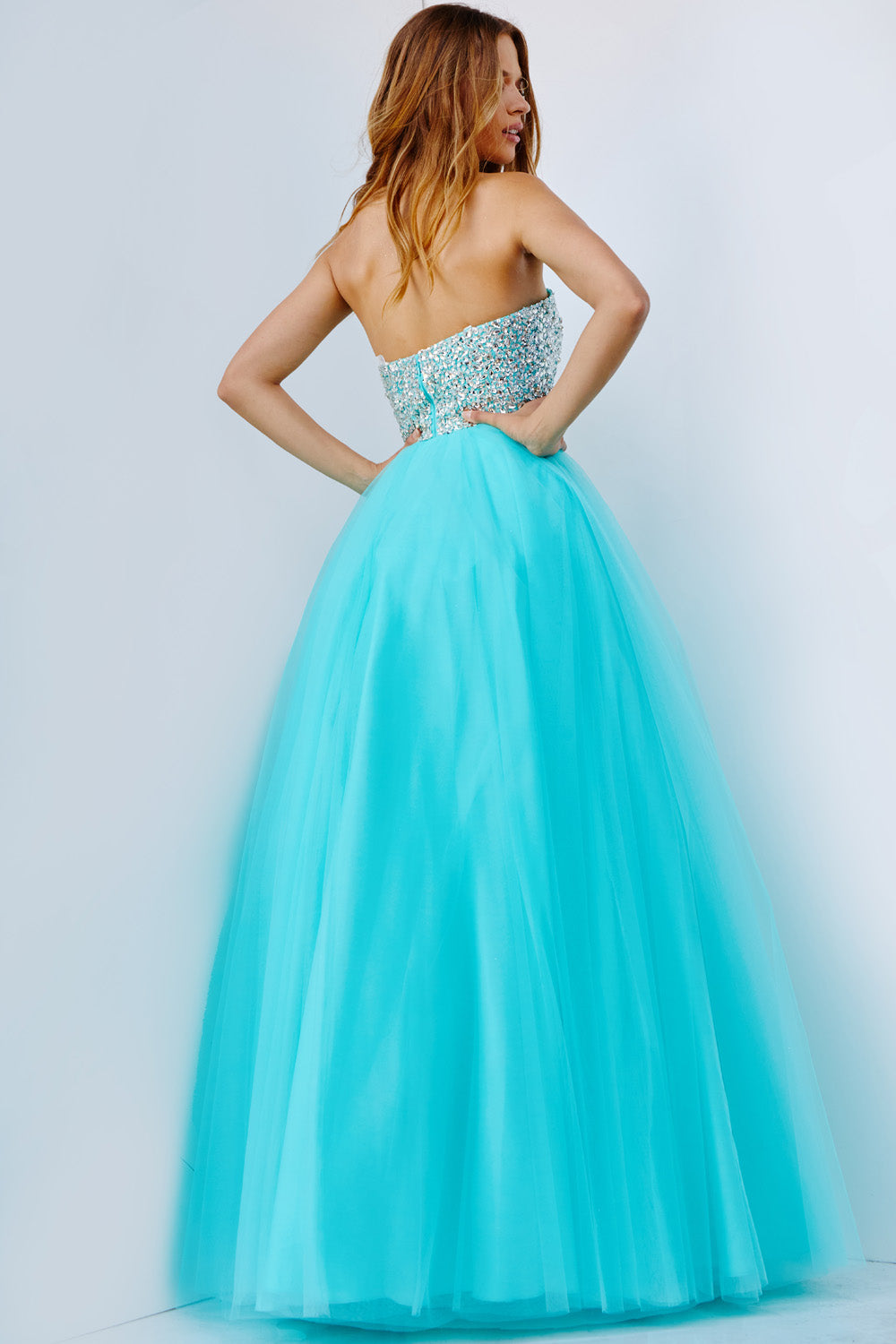 Jovani 52131 Aqua ballgown prom dress with a beaded bodice and lace-up back, back view.