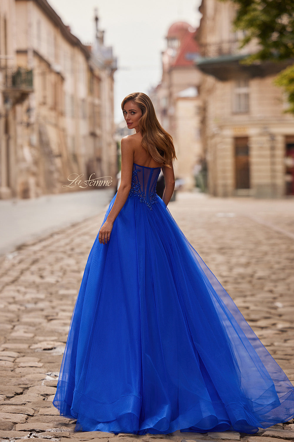 La Femme 33363 Royal blue A-line prom dress with lace-up back and flowing tulle skirt.