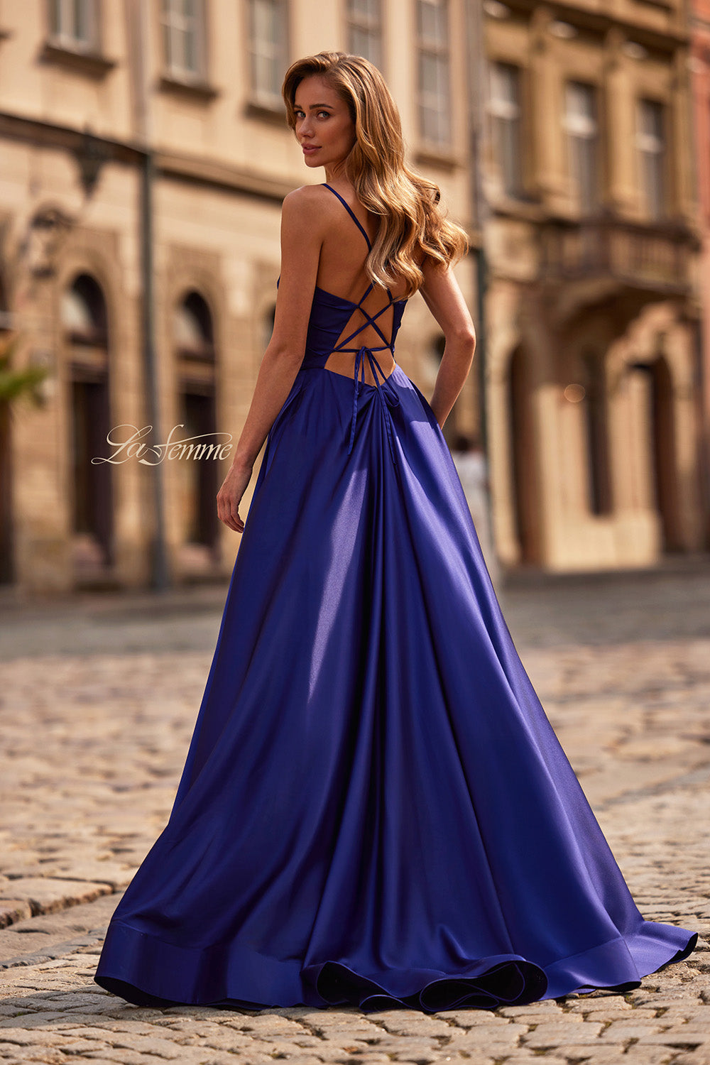 La Femme 33373 Indigo A-line prom dress with a lace-up back and flowing satin skirt.